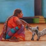 Woman petting Goats