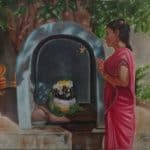 A woman praying to Pillaiyar