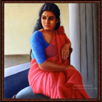Woman in pink Saree